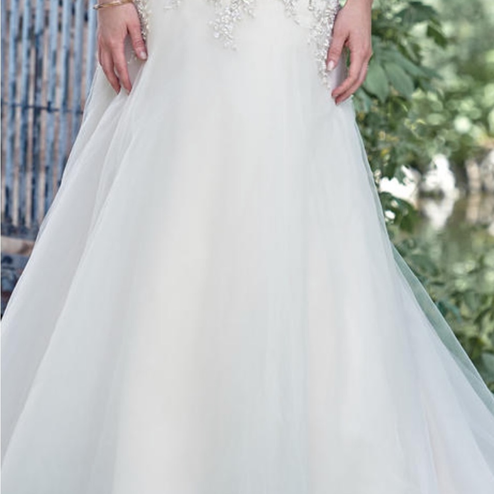Maggie Sottero Ivory Ball Gown with Silver Beaded Bodice - Picture 10 of 11